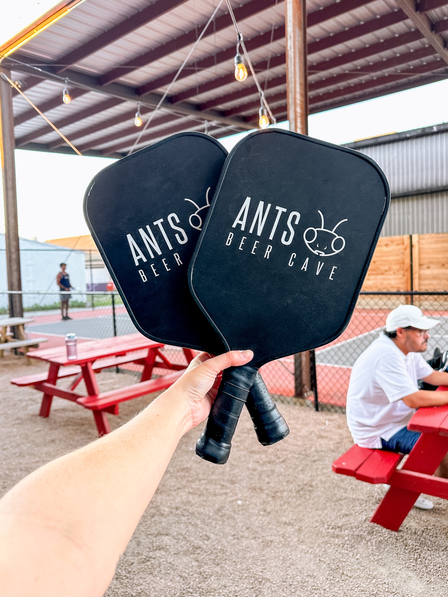 Ants Beer Cave branded pickleball paddles
